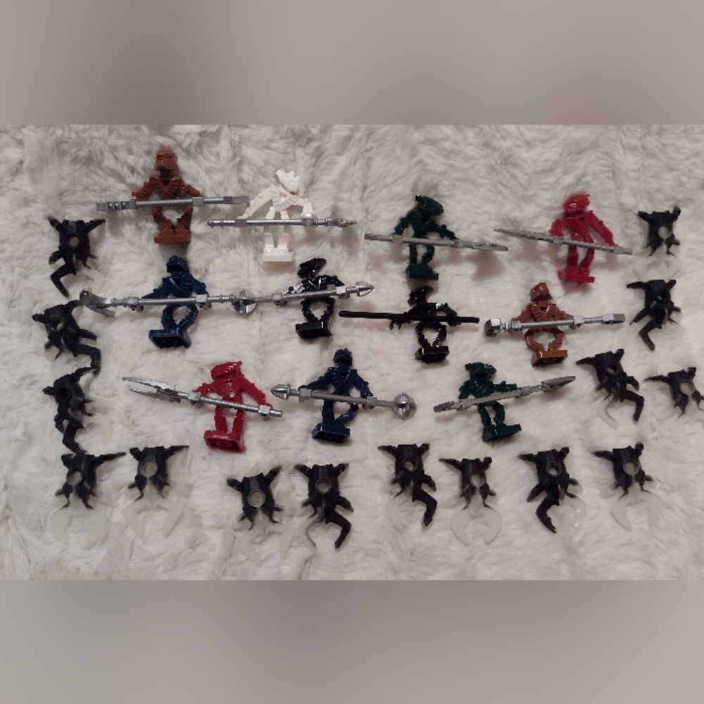 Lego Bionicle Minifigures Lot of 26 11 Figures w/ Weapons And 15 Spiders?